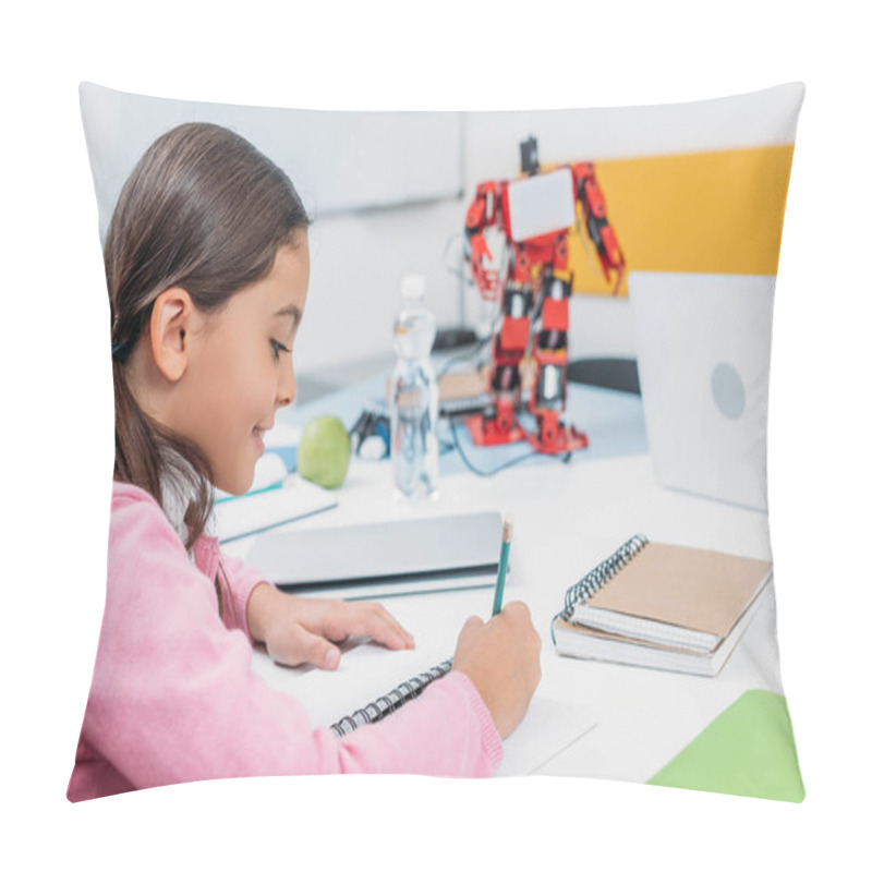 Personality  Schoolgirl Sitting At Desk With Robot Model And Writing In Notebook During STEM Lesson Pillow Covers