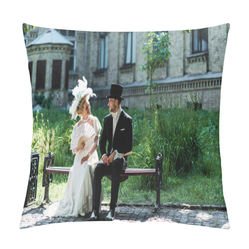 Personality  Cheerful Victorian Woman Holding Fan While Sitting With Young Man On Bench  Pillow Covers