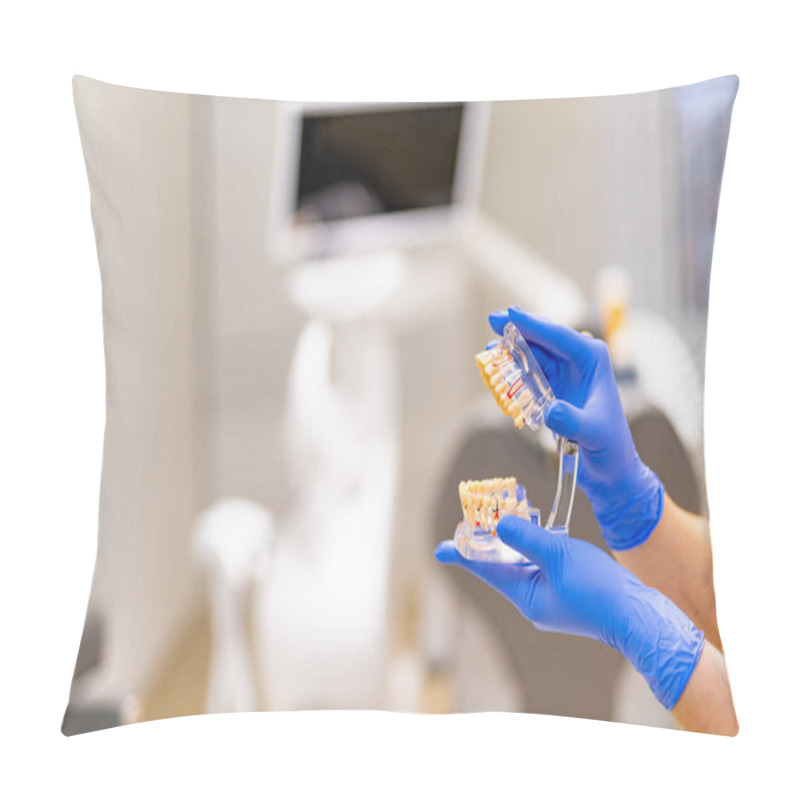 Personality  Dentist Showing Dental Model In Office. A Dental Professional In Gloves Showcases A Dental Model In An Office Setting Pillow Covers