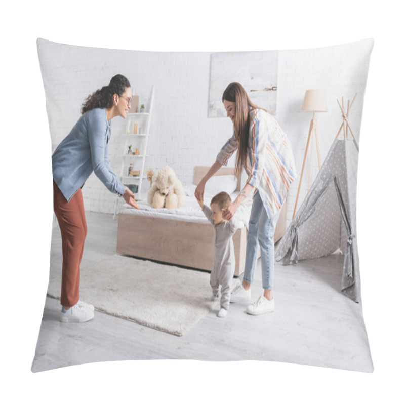 Personality  Mother Supporting Baby Boy Walking Near Smiling African American Woman In Glasses  Pillow Covers