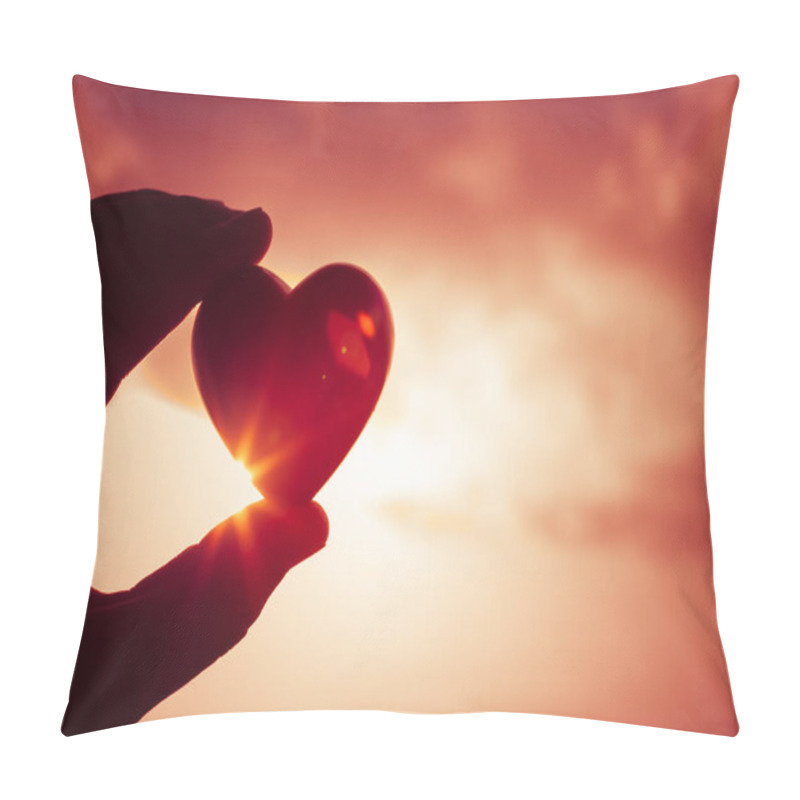 Personality  Hand Holding Heart Against Beautiful Sunset.  Pillow Covers