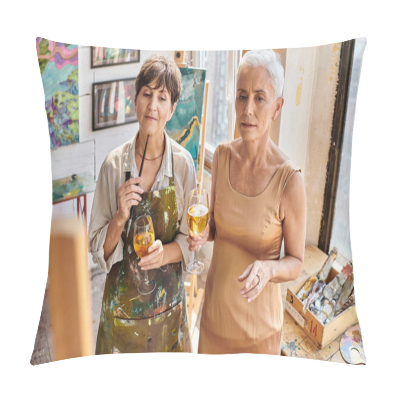 Personality  Thoughtful Woman Artist And Stylish Mature Model Standing With Wine Glasses  In Craft Workshop Pillow Covers