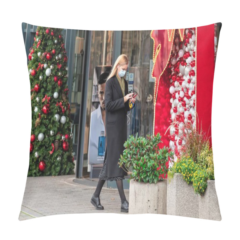 Personality  Vilnius, Lithuania - November 11 2020: Beautiful Blond Girl Wearing Mask And Walking In The City Near A Shop Or Shopping Center During Covid Or Coronavirus Outbreak, Christmas Background Pillow Covers