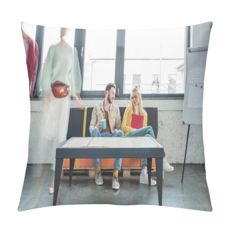 Personality  Female And Male Casual Businesspeople Sitting On Couch And Having Discussion In Loft Office With Colleagues In Motion Blur On Background  Pillow Covers