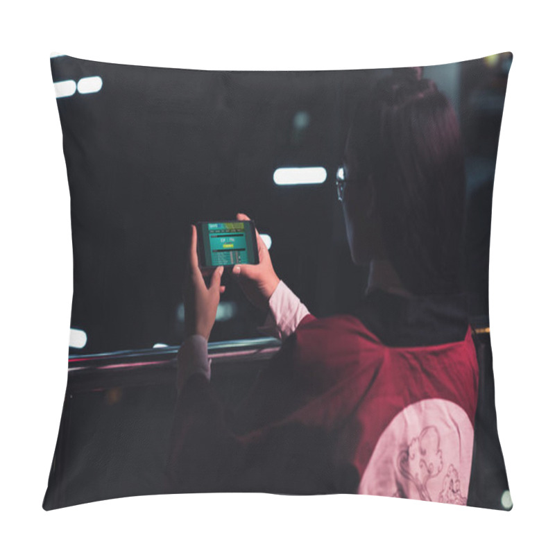 Personality  Back View Of Girl Holding Smartphone With Sports Bet Appliance On Street With Neon Light In Evening, City Of Future Concept Pillow Covers