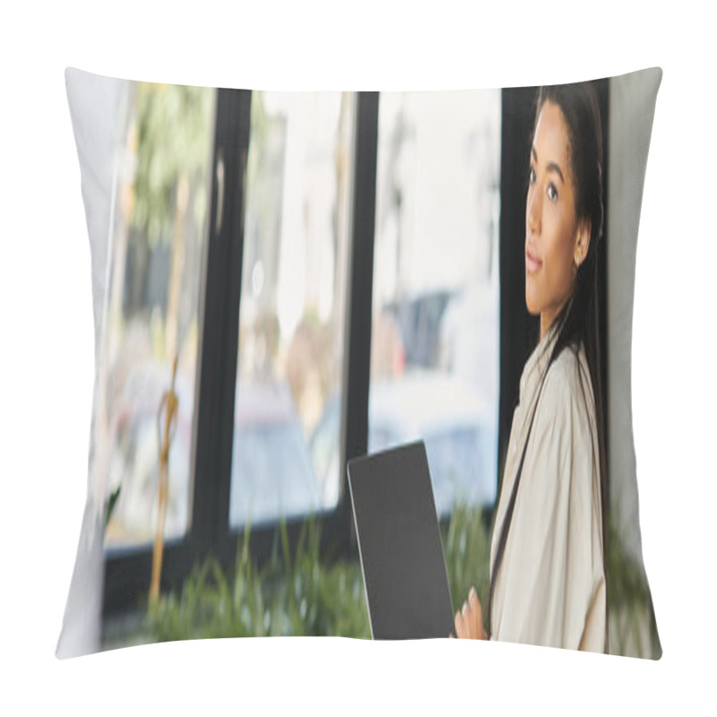 Personality  In A Contemporary Workspace, A Young Woman Engages With Her Laptop, Showcasing Her Focus. Pillow Covers