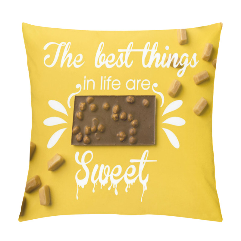 Personality  Top View Of Chocolate Bar With Scattered Iris Milk Candies Isolated On Yellow With 