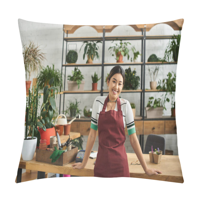 Personality  A Young Asian Woman, The Owner Of A Plant Shop, Smiles Warmly While Working In Her Store, Surrounded By Vibrant Greenery. Pillow Covers