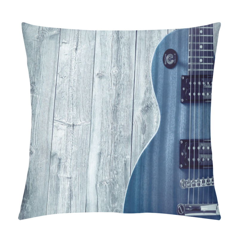 Personality  Part Of The Blue Electric Guitar On Wooden Background. A Place For Writing Of The Text. Pillow Covers