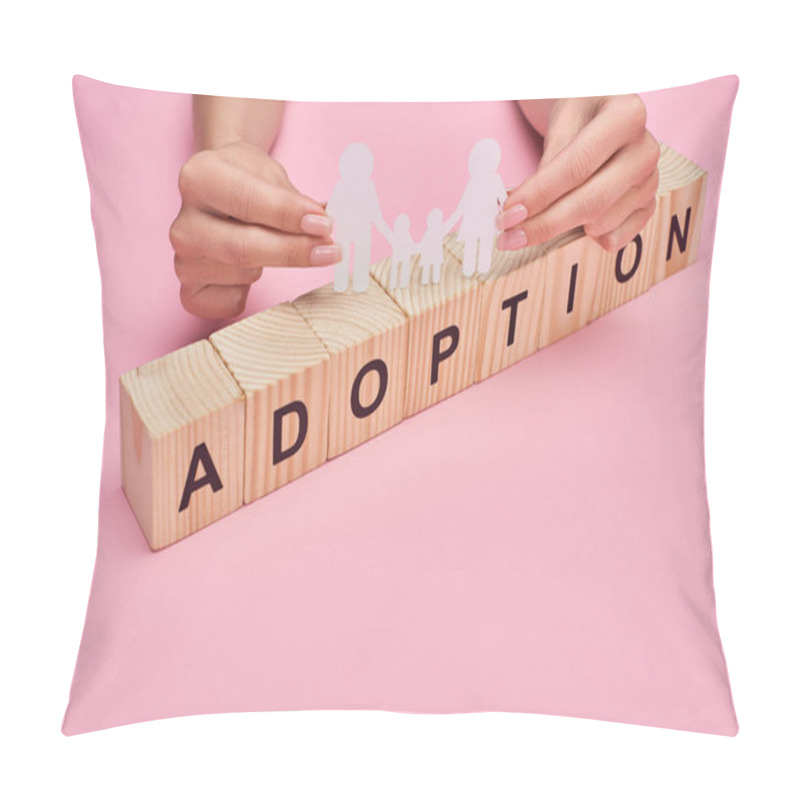 Personality  Cropped View Of Woman Holding Paper Cut Family On Wooden Cubes With Adoption Lettering On Pink Background Pillow Covers