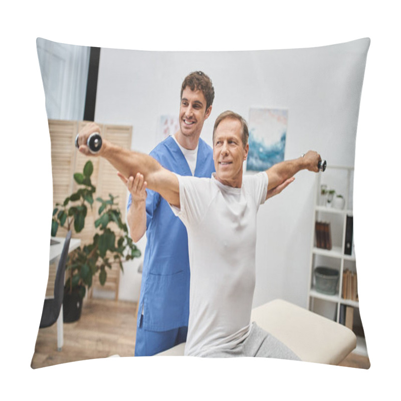 Personality  Cheerful Mature Patient Using Dumbbells During Rehabilitation With Help Of His Handsome Jolly Doctor Pillow Covers