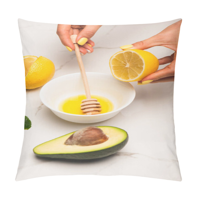 Personality  Cropped View Of Woman Mixing Honey With Lemon Near Cut Avocado And Rose Leaves On White Pillow Covers