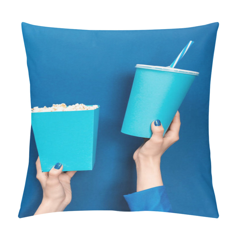 Personality  Cropped View Of Woman Holding Popcorn And Paper Cup On Blue Background  Pillow Covers