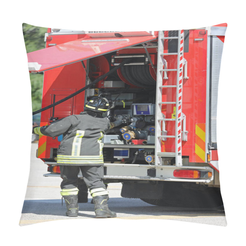 Personality  Red Fire Truck With The Rescue Team Is Deploying The Large Black Hose During An Emergency Response In The City Pillow Covers