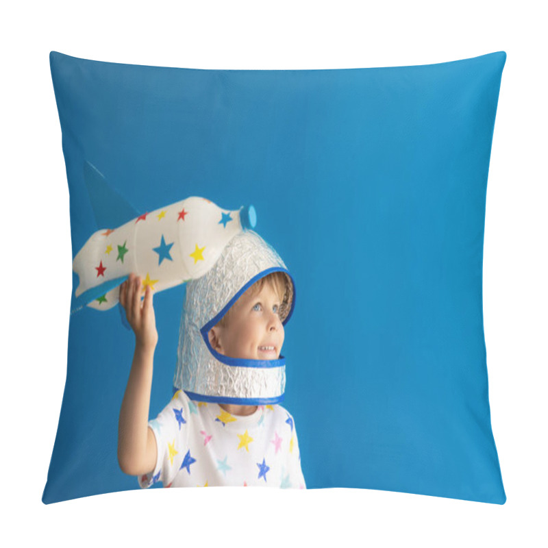 Personality  Happy Child Playing With Toy Rocket Against Blue Background. Kid Pretend To Be Astronaut. Imagination And Children Dream Concept Pillow Covers