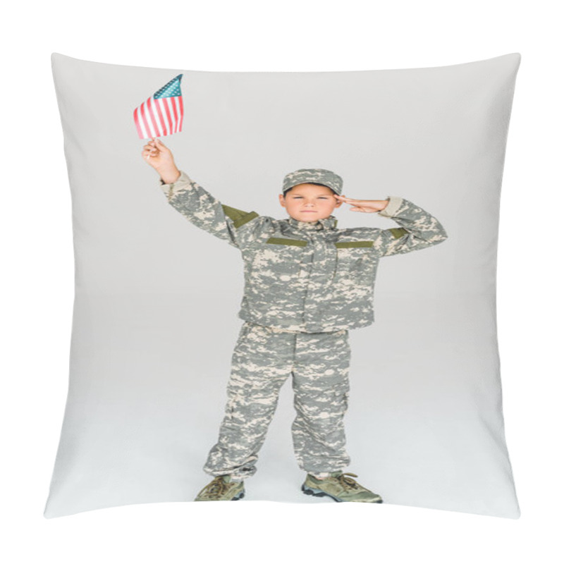 Personality  Little Boy In Camouflage Clothing Saluting While Holding American Flagpole In Hand Isolated On Grey Pillow Covers