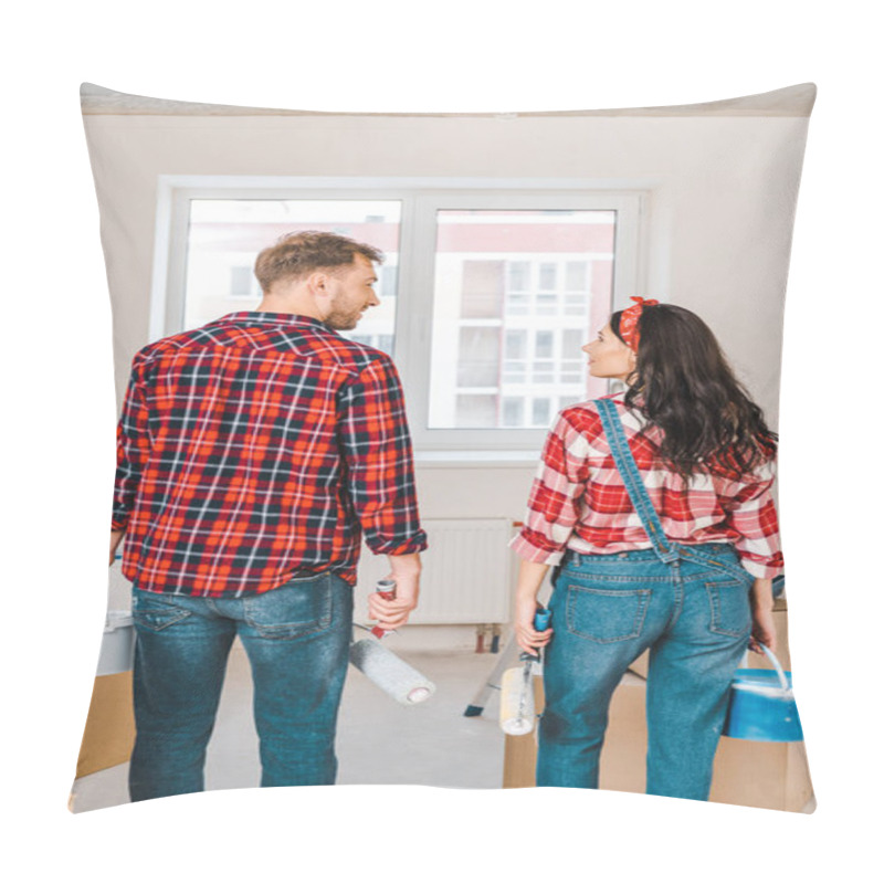 Personality  Man And Woman Holding Paint Buckets And Rollers While Standing Near Boxes Pillow Covers