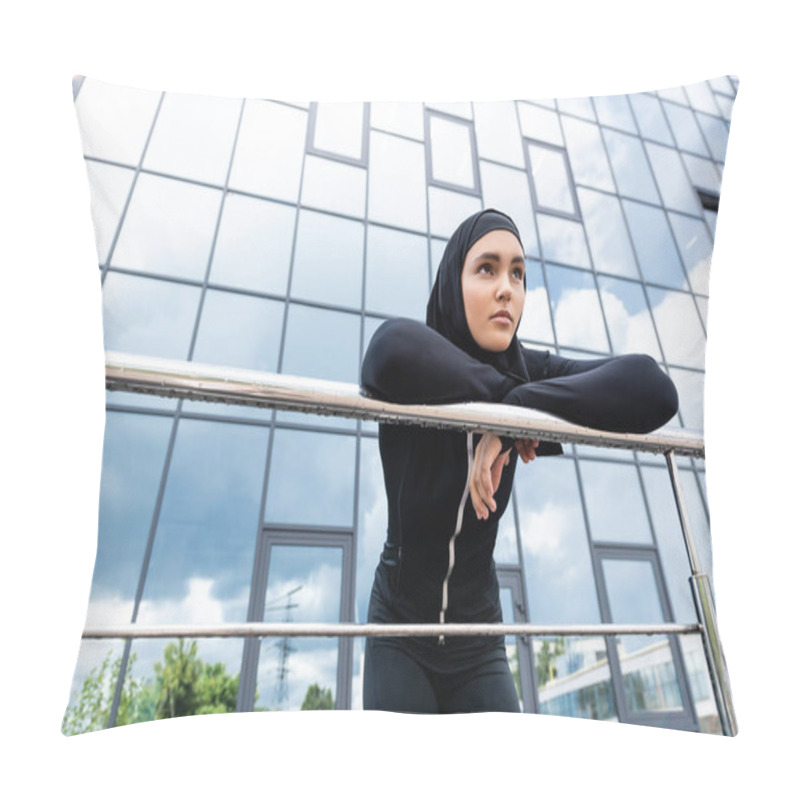 Personality  Low Angle View Of Muslim Woman In Hijab Standing Near Modern Building  Pillow Covers