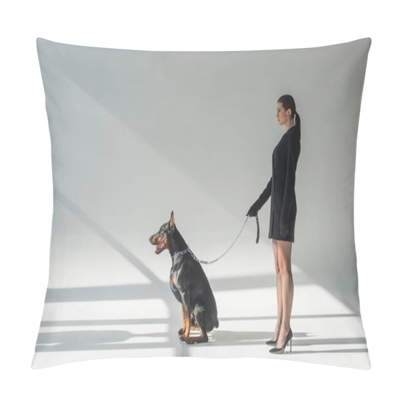 Personality  Side View Of Woman In Black Blazer Dress With Doberman On Chain Leash On Grey Background With Shadows Pillow Covers