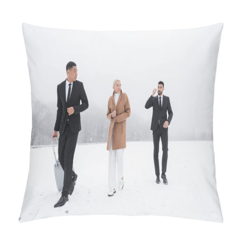 Personality  African American Security Man Carrying Suitcase Near Senior Businesswoman And Bi-racial Bodyguard On Snowy Field Pillow Covers