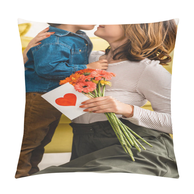 Personality  Cropped View Of Happy Woman Holding Flowers And Mothers Day Card With Heart Symbol While Embracing Adorable Son Pillow Covers