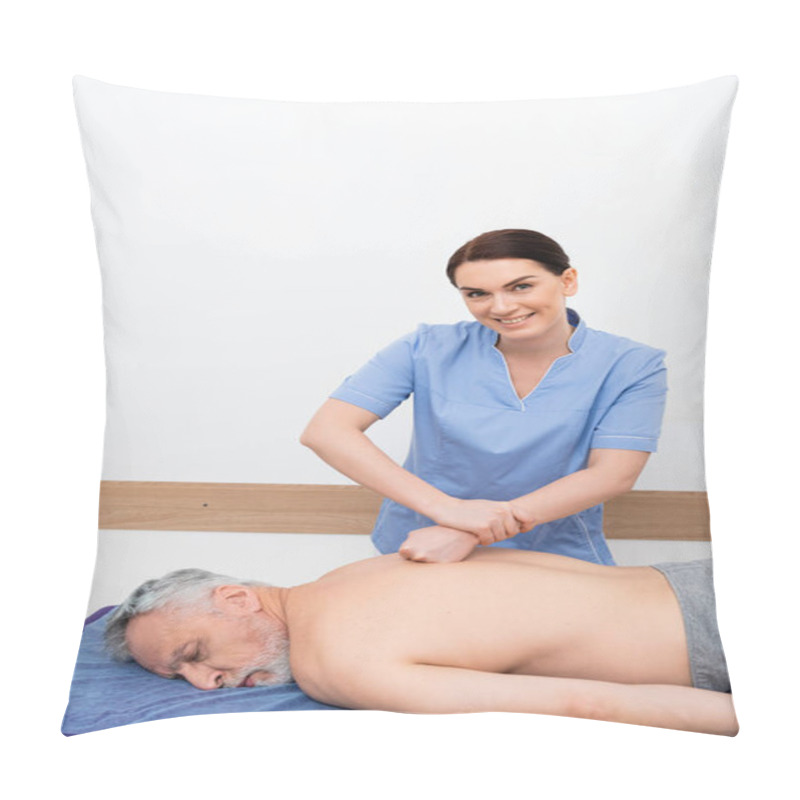 Personality  Masseuse Smiling At Camera While Doing Back Massage To Man In Rehabilitation Center Pillow Covers