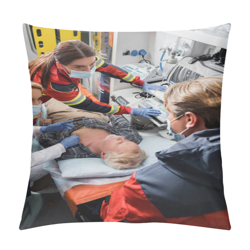 Personality  Selective Focus Of Paramedics And Doctor In Medical Masks Doing First Aid To Ill Patient In Ambulance Car  Pillow Covers