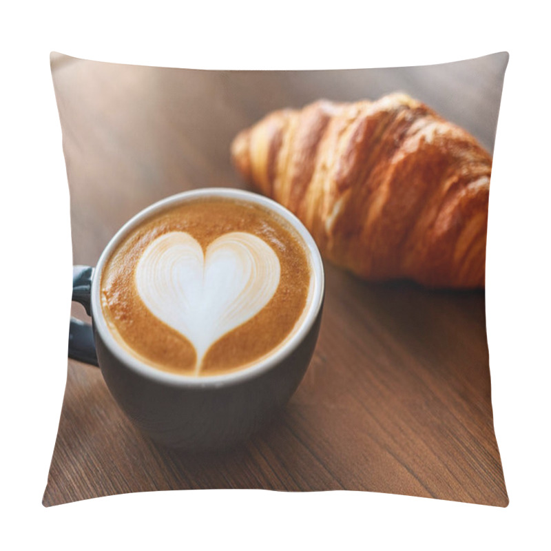 Personality  A Steaming Cup Of Latte Art Showcases A Heart Design, Accompanied By A Flaky Croissant, All Resting On A Rustic Wooden Table In A Serene Morning Setting. Pillow Covers