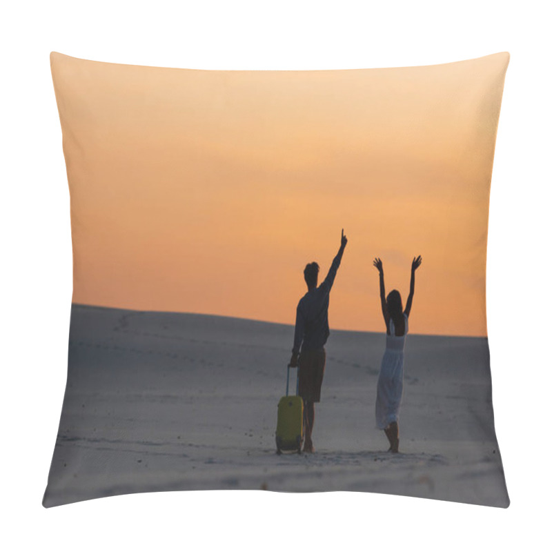 Personality  Back View Of Couple Walking On Beach With Hands In Air And Travel Bag At Sunset Pillow Covers