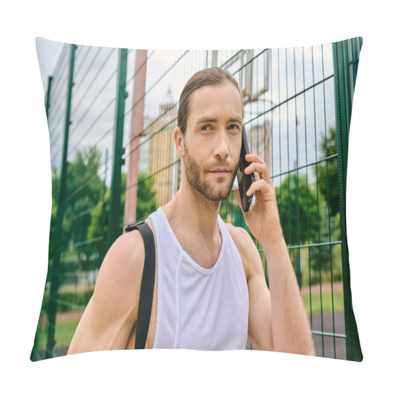 Personality  A Determined Man In Sportswear Talks On His Cell Phone In An Outdoor Setting While Showcasing His Strength And Focus. Pillow Covers