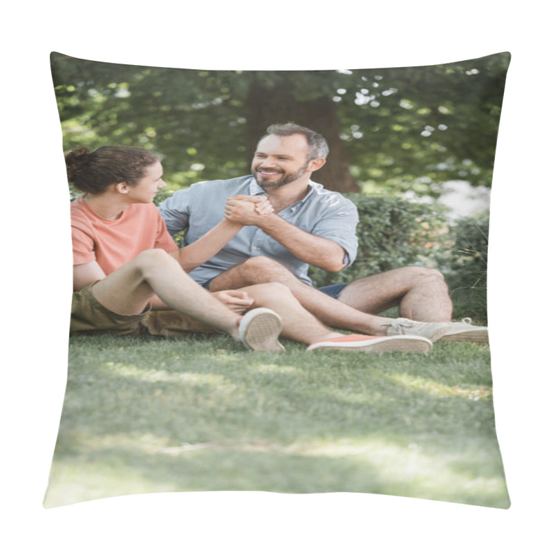 Personality  Happy Father And Son Shaking Hands While Sitting On Green Lawn In Park  Pillow Covers