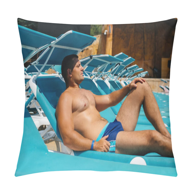 Personality  A Young Athletic Man Is Smiling Happily And Sunbathing On A Sun Lounger On A Sunny Day. Happy Vacation Vacation. Summer Holidays And Tourism. Pillow Covers