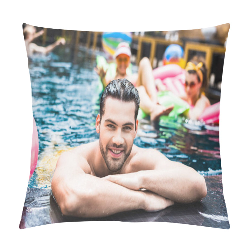 Personality  Happy Young Man Looking At Camera Near Poolside While His Female Friends Resting On Inflatable Mattresses In Swimming Pool Pillow Covers