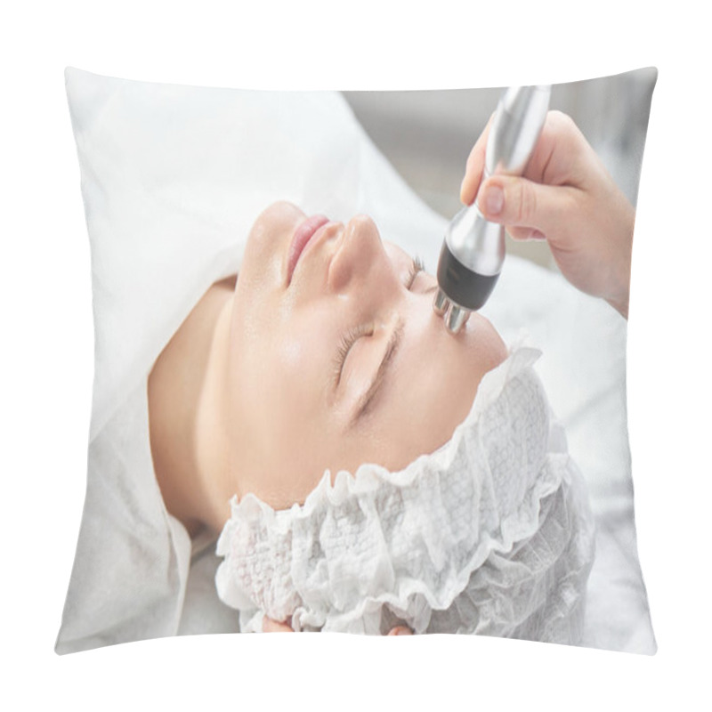 Personality  Professional Beautician In Office Conducts Session Of Thermal Or Radio Frequency Hardware RF Lifting. Tightening And Rejuvenation Of Face Skin Woman Patient Close Up Pillow Covers