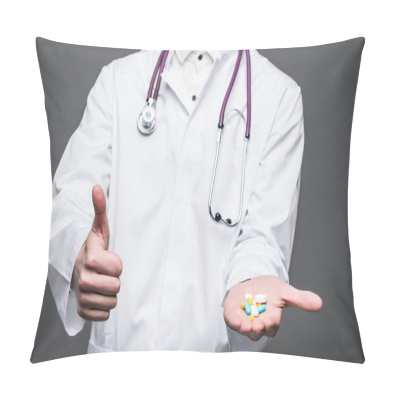 Personality  Young Doctor Offering Pill Isolated On Gray. Healthcare Pillow Covers