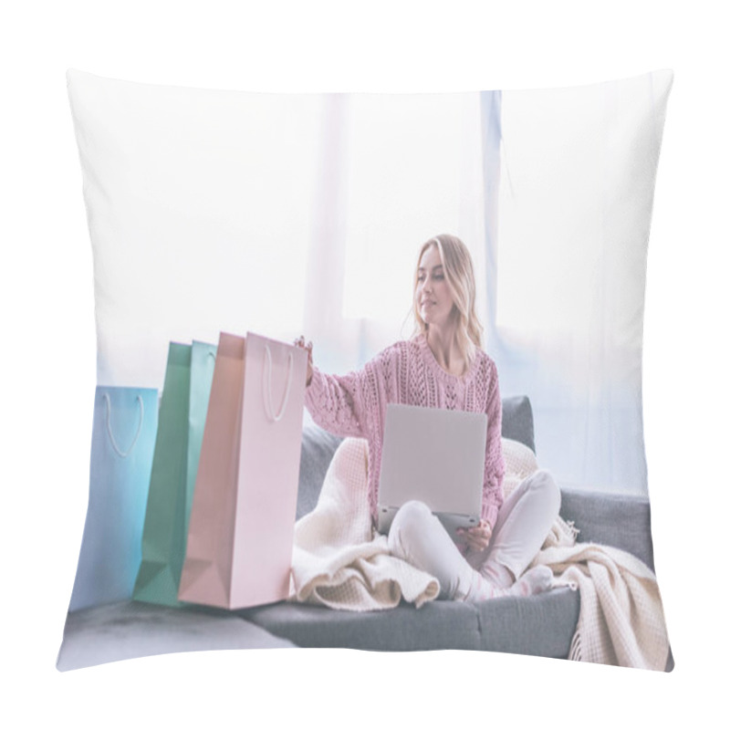 Personality  Attractive Blonde Woman Sitting On Sofa With Laptop Near Shopping Bags Pillow Covers