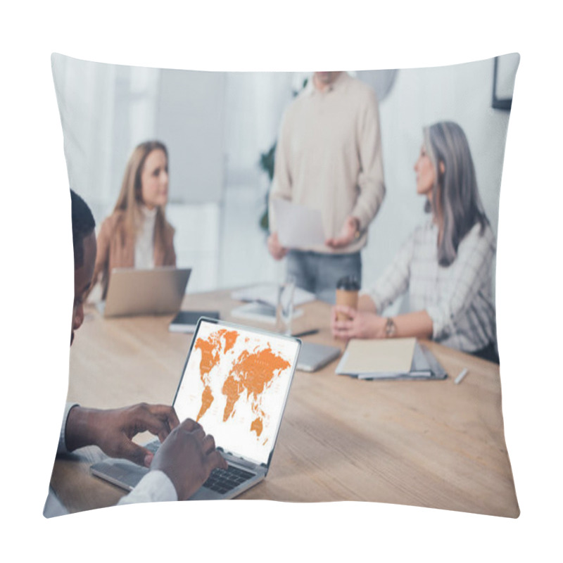 Personality  Selective Focus Of African American Man Using Laptop With Map And His Colleagues Talking On Background  Pillow Covers