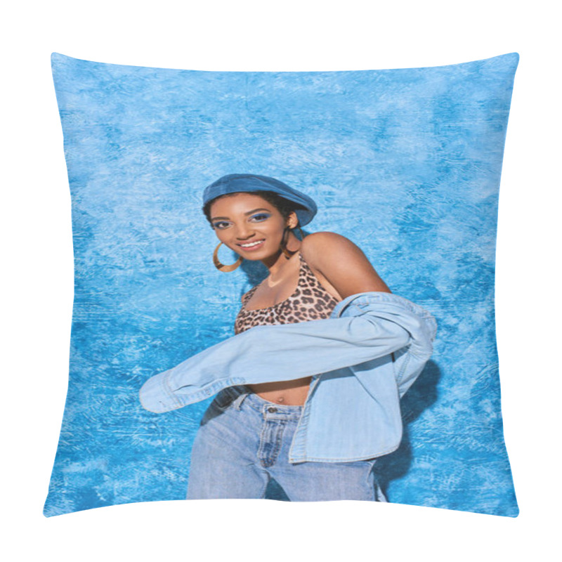 Personality  Fashionable African American Model In Golden Earrings, Beret And Denim Shirt Smiling At Camera While Posing And Standing On Blue Textured Background, Stylish Denim Attire Pillow Covers