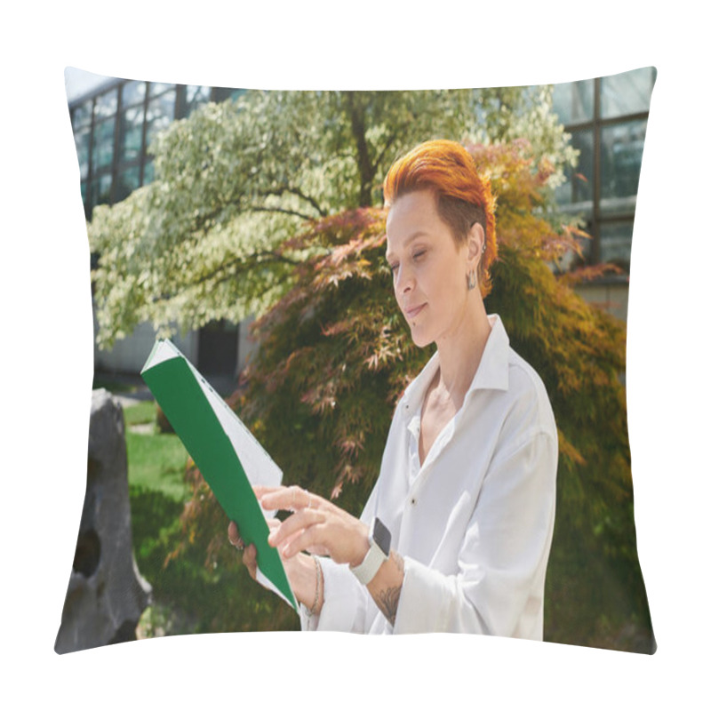 Personality  A Teacher With Bright Red Hair Reviews Papers While Standing In A Campus Garden. Pillow Covers