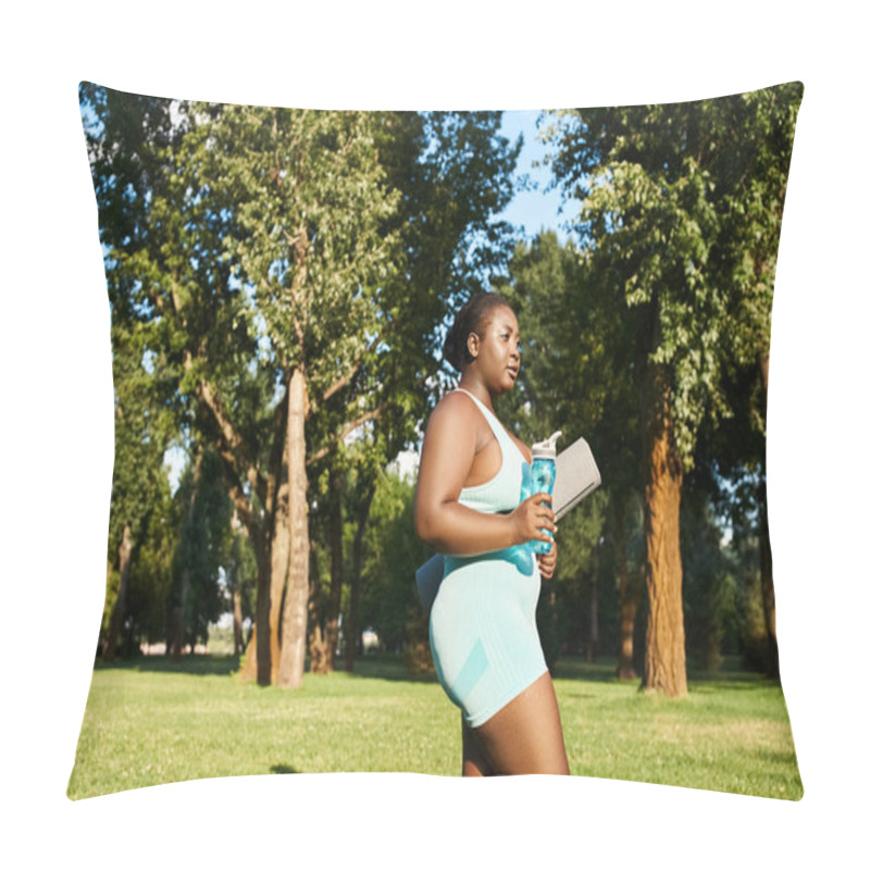 Personality  A Woman In A Blue Outfit Stands Elegantly, Cradling A Book In Her Hands. Pillow Covers