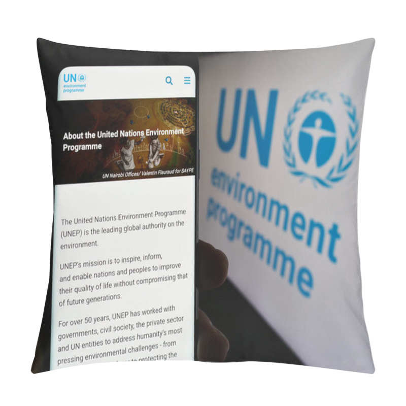 Personality  Stuttgart, Germany - 07-27-2023: Person Holding Mobile Phone With Web Page Of United Nations Environment Programme (UNEP) On Screen With Logo. Focus On Center Of Phone Display. Pillow Covers