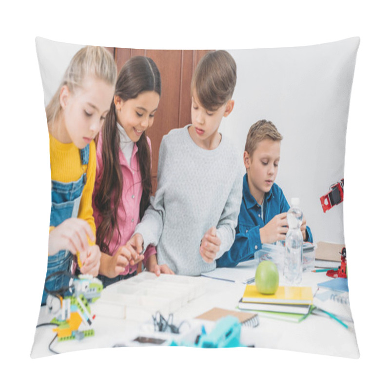 Personality  Focused Children Working Together On STEM Project In Classrom Pillow Covers