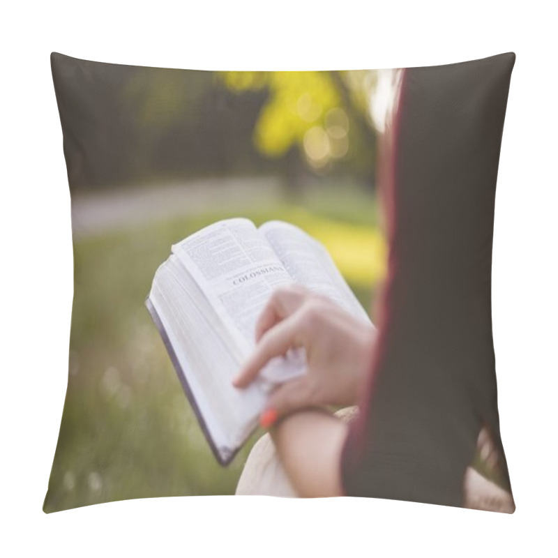 Personality  Closeup Shot Of A Female Sitting While Reading The Bible With A Blurred Background Pillow Covers