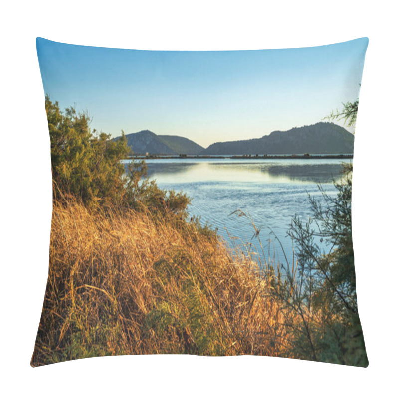 Personality  Sunset Light Illuminates Golden Grasses And Calm Waters Of Gialova Lagoon In Greece, With Distant Hills Creating A Serene Backdrop. Pillow Covers