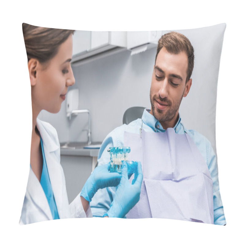 Personality  Selective Focus Of Man Looking At Teeth Model In Hands Of Attractive Dentist  Pillow Covers