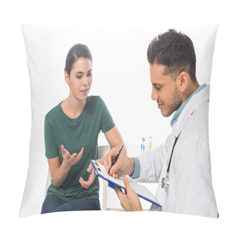 Personality  Doctor Writing On Clipboard Near Patient On Chair Isolated On White Pillow Covers