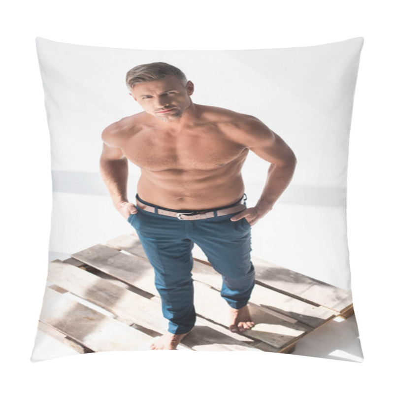 Personality  High Angle View Of Shirtless Handsome Adult Man Standing On Pallet On White And Looking At Camera Pillow Covers