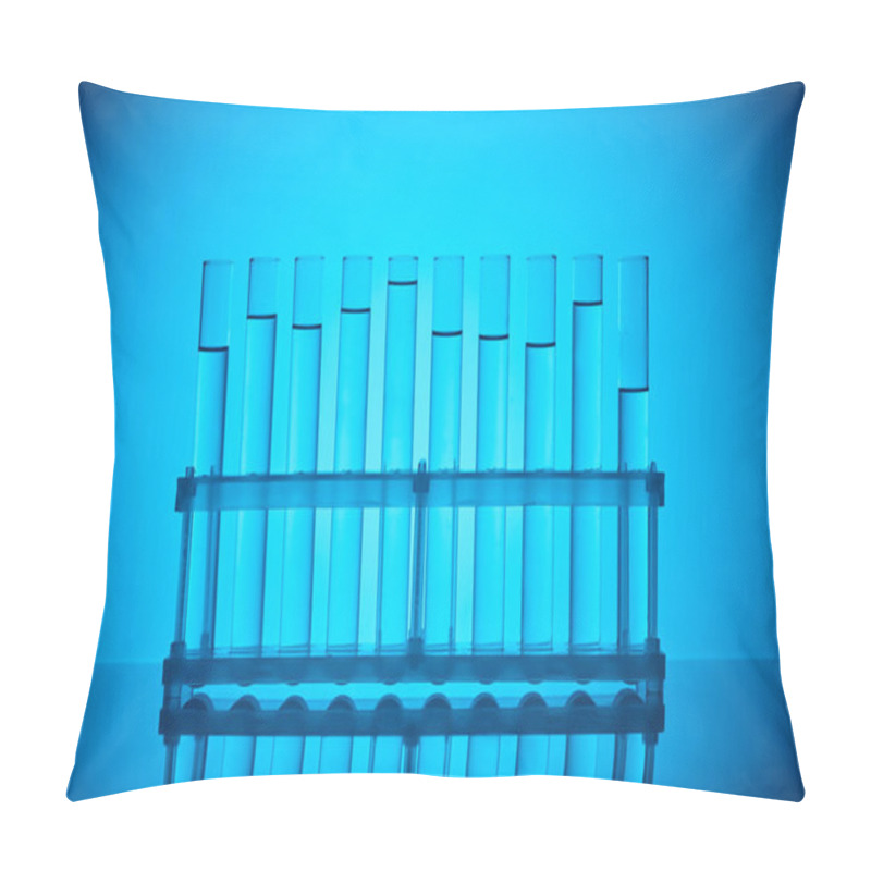 Personality  Row Of Glass Tubes With Liquid On Stand On Blue Pillow Covers