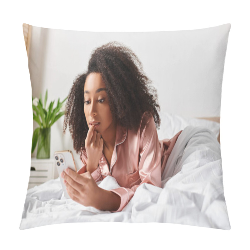 Personality  A Curly African American Woman In Pajamas Lays In Bed, Engrossed As She Looks At Her Cell Phone On A Lazy Morning. Pillow Covers