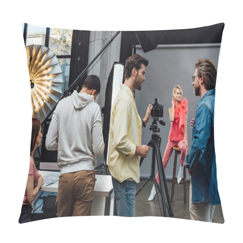 Personality  Selective Focus Of Art Director In Glasses Looking At Photographer Near Assistants And Model  Pillow Covers